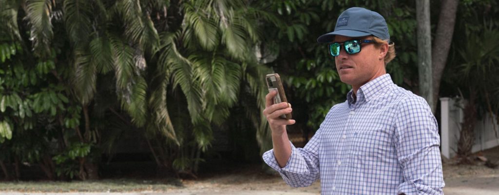 Man using his mobile device