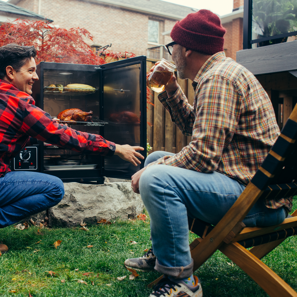 OutdoorLiving-Marketing Guys sitting by smoker