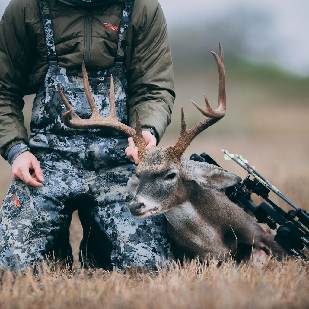 guy holding deer